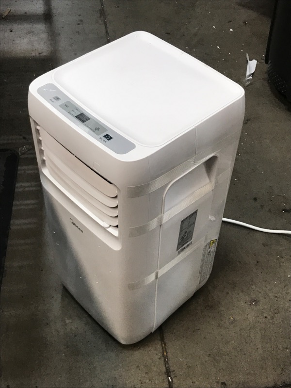 Photo 2 of Midea 8,000 BTU ASHRAE (5,300 BTU SACC) Portable Air Conditioner, Cools up to 175 Sq. Ft., Works as Dehumidifier & Fan, Remote Control & Window Kit Included 13"D x 17.1"W x 28.3"H

