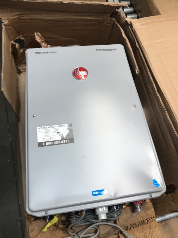 Photo 5 of **MISSING PARTS**
Rheem RTGH-68DVLN-2 Professional Prestige Series: 6.8 GPM High Efficiency Condensing Tankless Water Heater, Gray 27.5 x 9.75 x 28.5 inches

