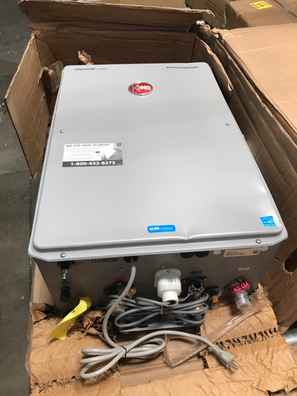 Photo 2 of **MISSING PARTS**
Rheem RTGH-68DVLN-2 Professional Prestige Series: 6.8 GPM High Efficiency Condensing Tankless Water Heater, Gray 27.5 x 9.75 x 28.5 inches

