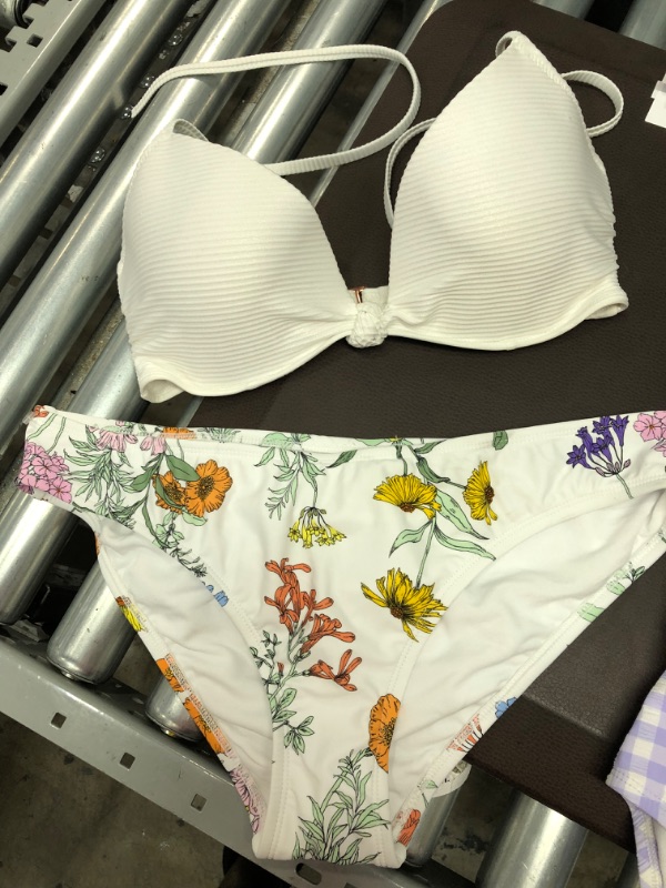 Photo 2 of 5 PCS BUNDLE
White With Flower Print Bikini Bottom
SIZE L
Light Purple Gingham One Piece Swim Suit
SIZE L
White Pearl Effect Bikini Top
SIZE 34C
Lace Black Underwear
SIZE XS
Brown One Piece Bikini 
SIZE L