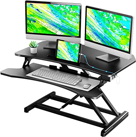 Photo 1 of Electric Standing Desk Converter with Wide Storage Keyboard Tray, 32'' Motorized Height Adjustable Stand Up Desk Riser with USB Port, Quick Sit to Stand Tabletop Dual Monitor Riser for Home Office
