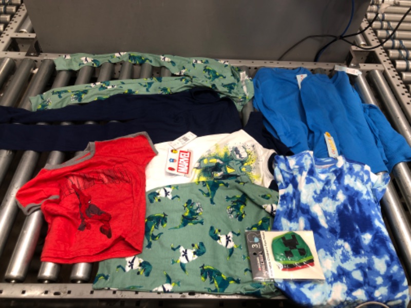 Photo 1 of **BUNDLE OF 9**
Bundle of boys clothes and face masks. (Sizes: 4/5, 8)