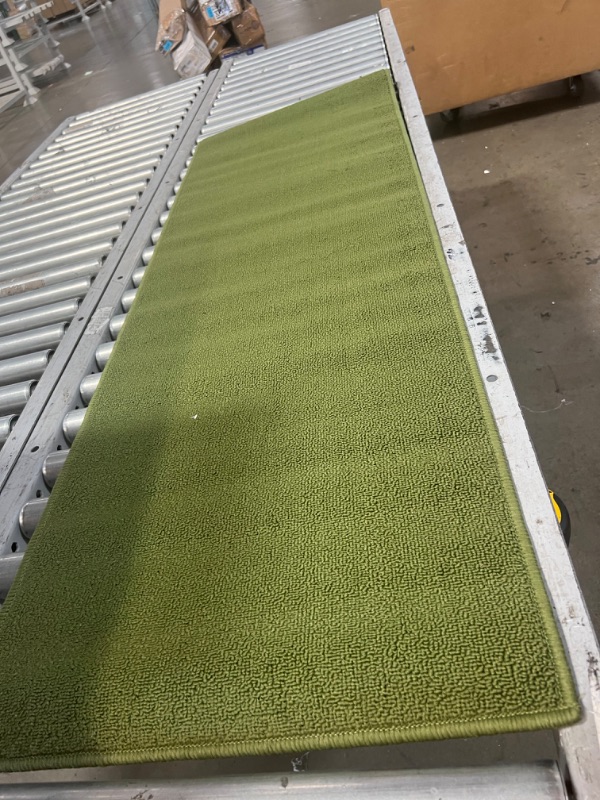 Photo 1 of 1' 7'' x 5' green walk way rug