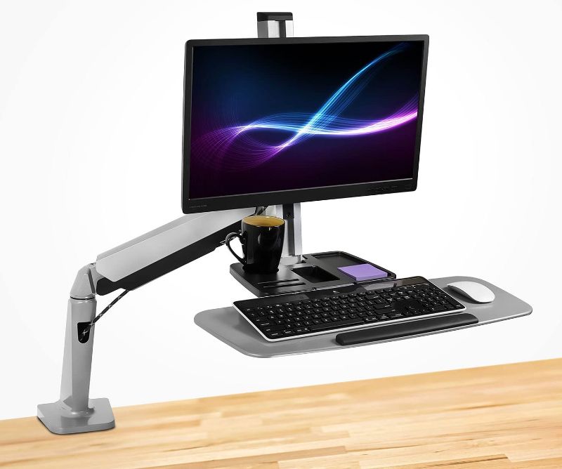 Photo 1 of Mount-It! Sit Stand Workstation for Single Monitor and Keyboard - Height Adjustable Standing Desk Mount with Monitor Mount and Keyboard Tray
