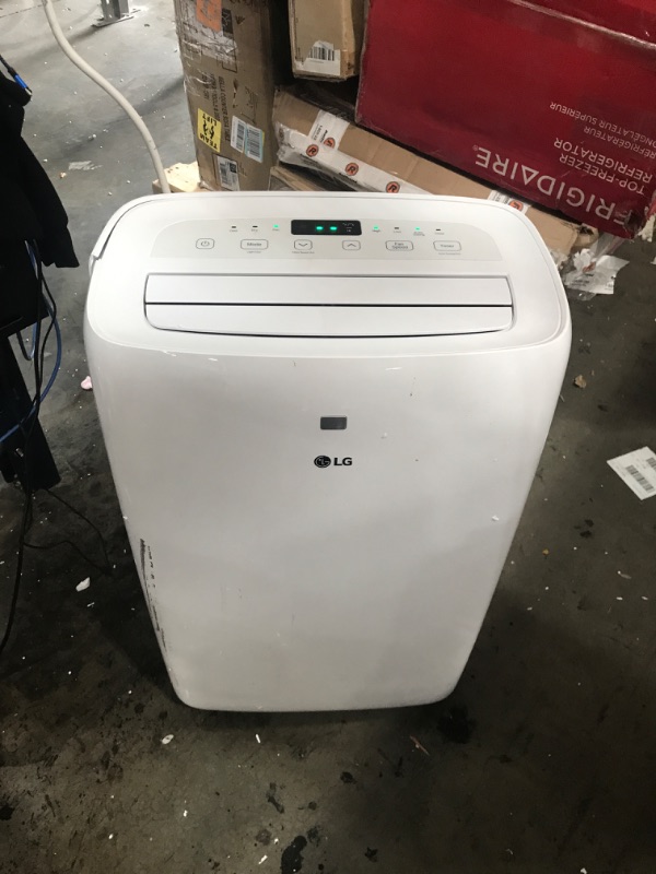 Photo 2 of LG 6,000 BTU (DOE) / 8,000 BTU (ASHRAE) Portable Air Conditioner, Cools 250 Sq.Ft. (10' x 25' room size), Quiet Operation, LCD Remote, Window Installation Kit Included, 115V
