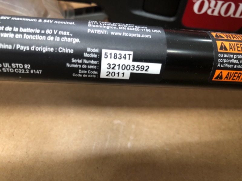 Photo 2 of (NON-FUNCTIONAL BATTERY) Toro 60V Max Lithium-Ion Cordless String Trimmer and Leaf Blower Combo Kit (2-Tool), 2.0 Ah Battery and Charger Included