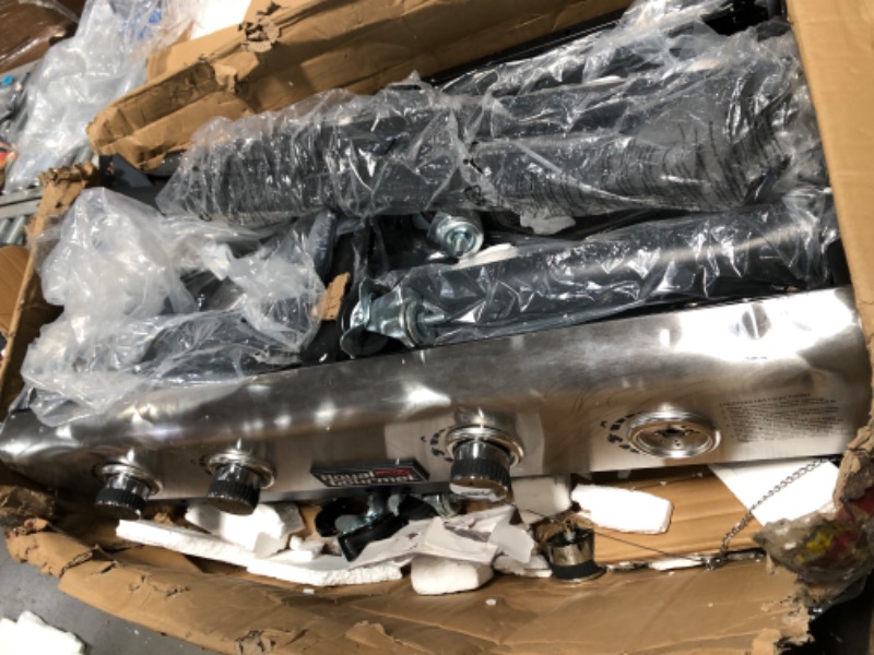 Photo 1 of INCOMLETE, Royal Gourmet GD401C 4-Burner Portable Propane Flat Top Gas Grill and Griddle Combo, Black
**MISSING LEGS, LOOSE AND MISSING HARDWARE, 1 BKNOB IS NOT ATTACHED, MISSING COVER**
