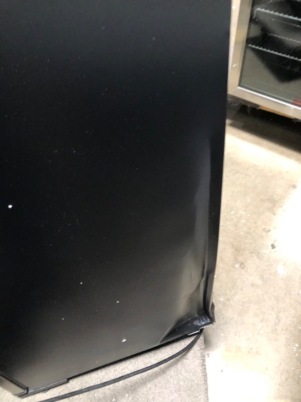 Photo 4 of (MINOR DAMAGE)Danby - Designer 4.4 Cu. Ft. Mini Fridge - Black/stainless steel look
**DENT**
