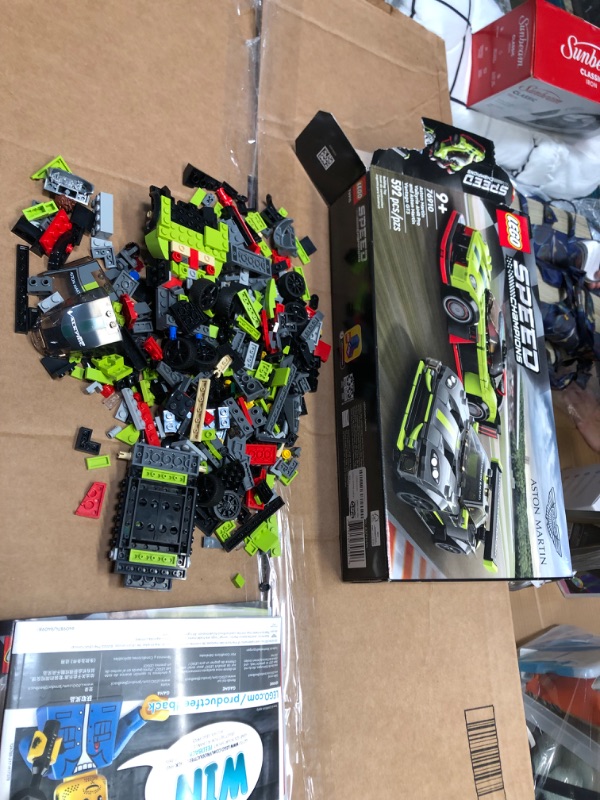 Photo 4 of BUNDLE, INCOMPLETE LEGO® Speed Champions Aston Martin Valkyrie AMR Pro and Aston Martin Vantage GT3 Building Kit, 592 Pieces
AND, BABY CAR KEY TOY
**LEGOS LOOSE AND MISSING PIECES**