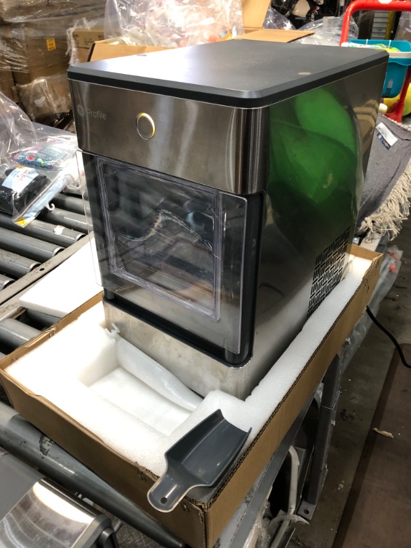 Photo 1 of GE Profile Opal | Countertop Nugget Ice Maker with Side Tank | Portable Ice Machine Makes up to 24 Lbs. of Ice per Day | Stainless Steel Finish
