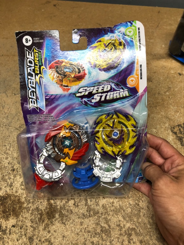 Photo 2 of BEYBLADE Burst Surge Speedstorm Spear Valtryek V6 and Regulus R6 Spinning Top Dual Pack -- 2 Battling Game Top Toy for Kids Ages