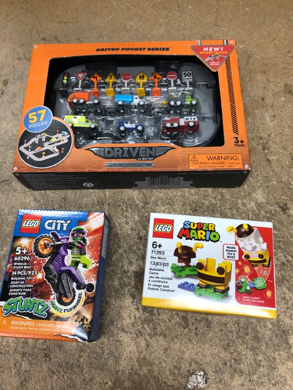 Photo 1 of BUNDLE OF 3 TOY ITEMS----Bee Mario Power-Up Pack 71393, LEGO CITY WHEELIE STUNT BIKE , 57 DRIVEN POCKET SERIES 