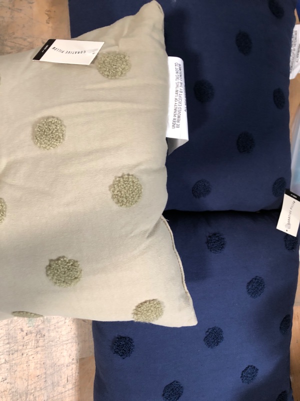 Photo 1 of 2 blue pillows and 2 green pillow 