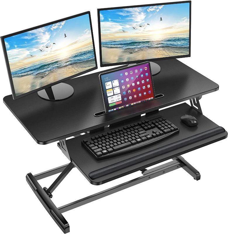 Photo 1 of AboveTEK Standing Desk Converter, 36" Stand Up Desk Riser with Gel Wrist Rest, Tabletop Sit Stand Desk Fits Dual Monitors, Two Tiered Adjustable Height Desk with Removal Keyboard Tray, Black
