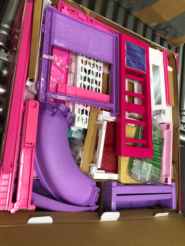 Photo 2 of Barbie Dreamhouse Dollhouse with Wheelchair Accessible Elevator, Pool, Slide and 70 Accessories Including Furniture and Household Items, Gift for 3 to 7 Year Olds
