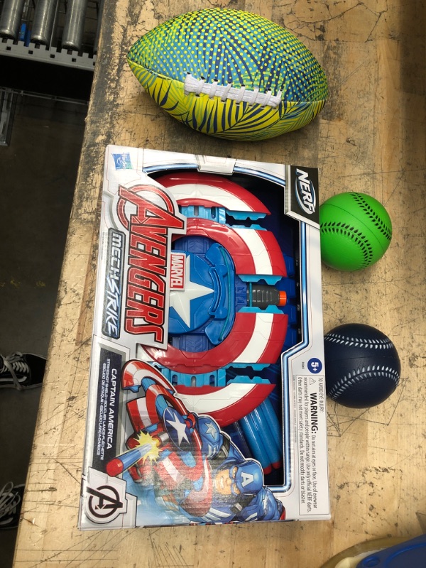 Photo 2 of bundle of 4 toys:
2 foam baseballs,
Avengers Mech Strike Captain America Strikeshot Shield,
water football