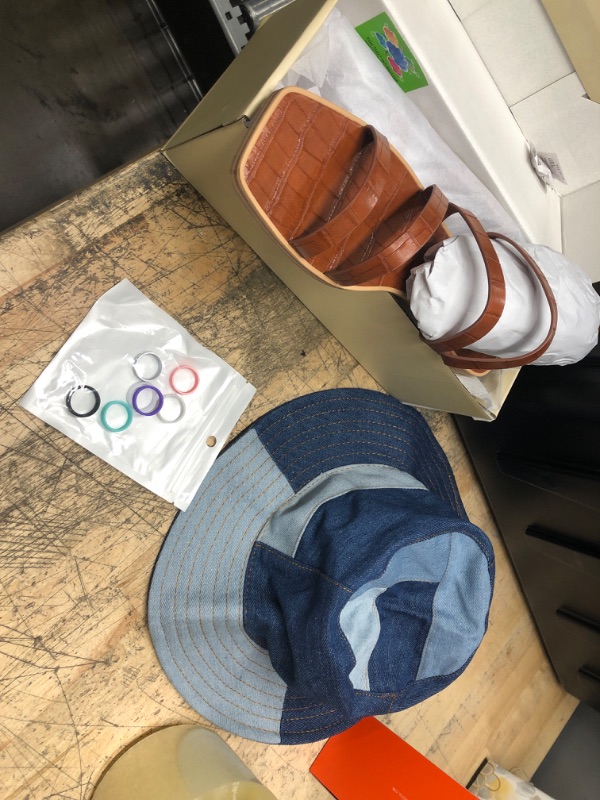 Photo 1 of **bundle of 3 items, rubber rings, size 8 brown sandals, jean bucket hat