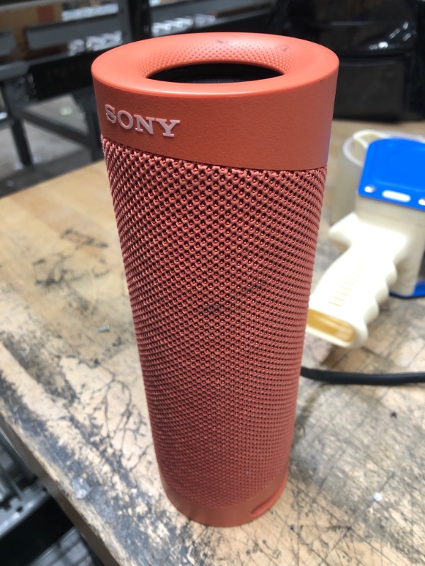 Photo 1 of Sony SRS-XB23 EXTRA BASS Wireless Bluetooth Portable Lightweight Travel Speaker, IP67 Waterproof & Durable for Outdoor, 12 Hour Battery, USB Type-C, Removable Strap and Speakerphone, Coral Red
