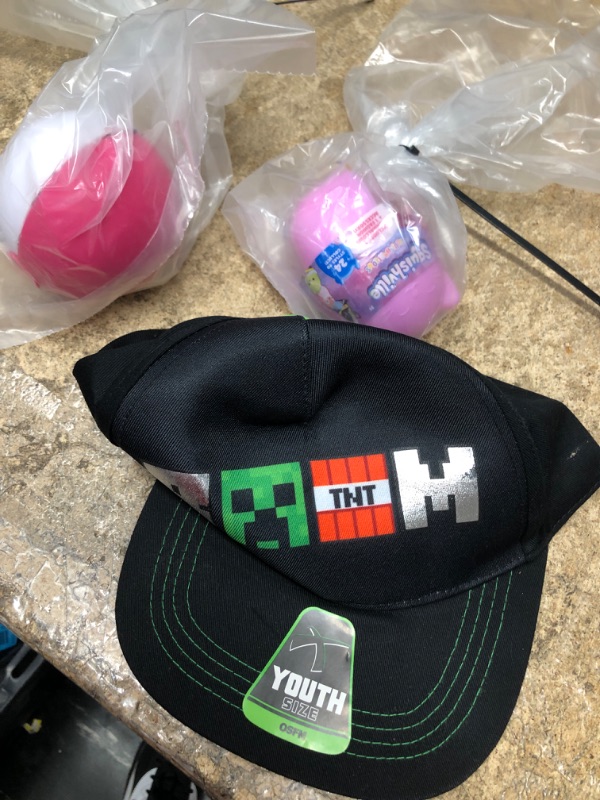 Photo 1 of BUNDLE OF 3 ITEMS
MINECRAFT HAT, 2 USED TOYS