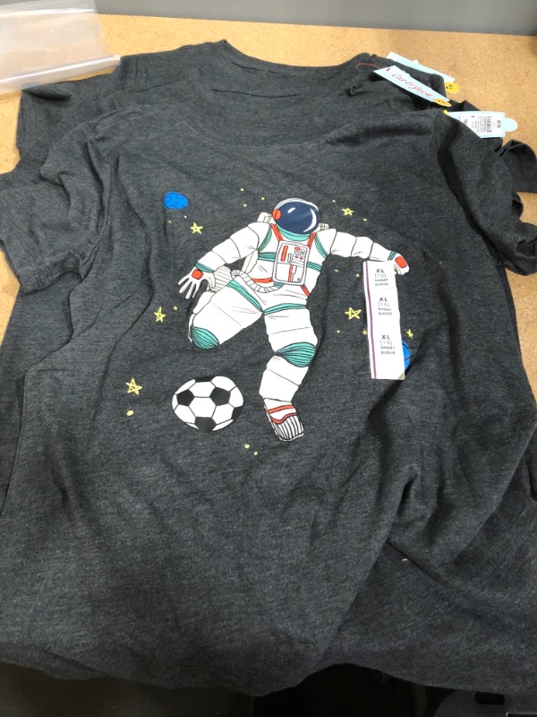 Photo 2 of 3- Boys' Short Sleeve Astronaut Soccer Graphic T-Shirt - Cat & Jack™ XL,L 
