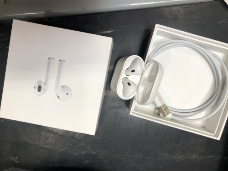 Photo 2 of Apple AirPods True Wireless Bluetooth Headphones (2nd Generation) with Charging Case

