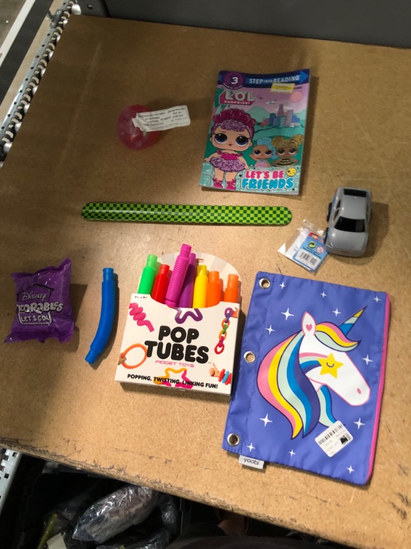 Photo 2 of 7 ITEM CHILDRENS TOY BUNDLE) (Let's Be Friends (L.O.L. Surprise!) + POP TUBES+ SLAP ON BRACELET + LITTLE TYKES CAR + DISNEY DOORABLES MYSTERY PACK + AND SQUISH TOY