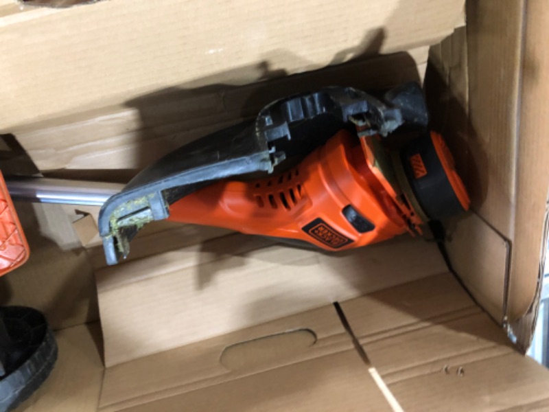 Photo 1 of Black & Decker MTC220 Max Cordless Lithium-Ion 3-in-1 Trimmer/Edger & Mower, Orange/ Black