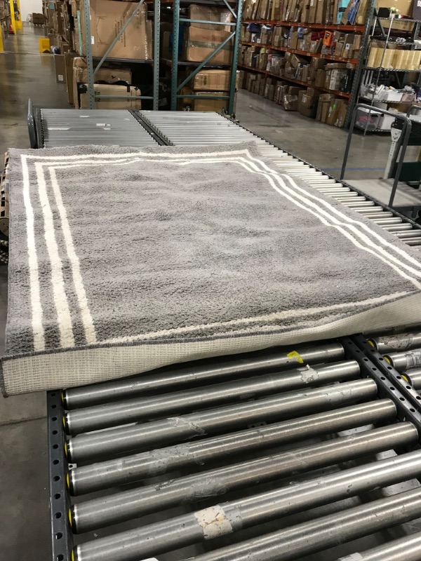 Photo 1 of 5FT X 6 1/2 FT AREA RUG