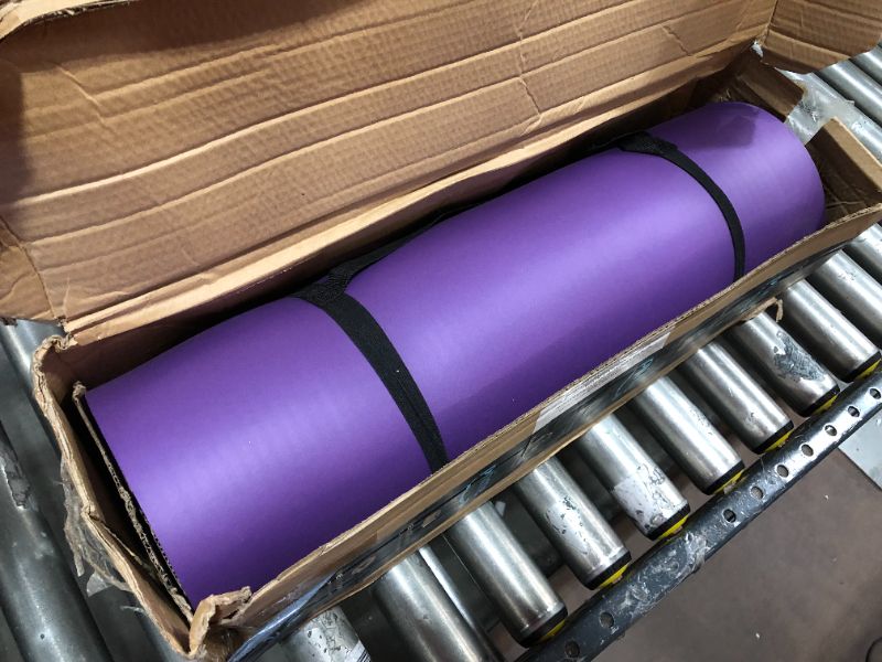 Photo 2 of Amazon Basics Extra Thick Exercise Yoga Gym Floor Mat with Carrying Strap - 74 x 24 x .5 Inches, Purple