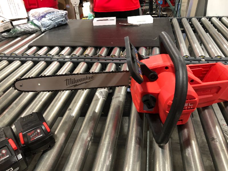 Photo 4 of M18 FUEL 16 in. 18-Volt Lithium-Ion Battery Brushless Cordless Chainsaw Kit with 12.0 Ah Battery and M18 Rapid Charger