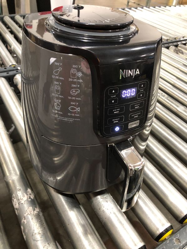 Photo 2 of Ninja AF101 Air Fryer that Crisps, Roasts, Reheats, & Dehydrates, for Quick, Easy Meals, 4 Quart Capacity, & High Gloss Finish, Black/Grey
