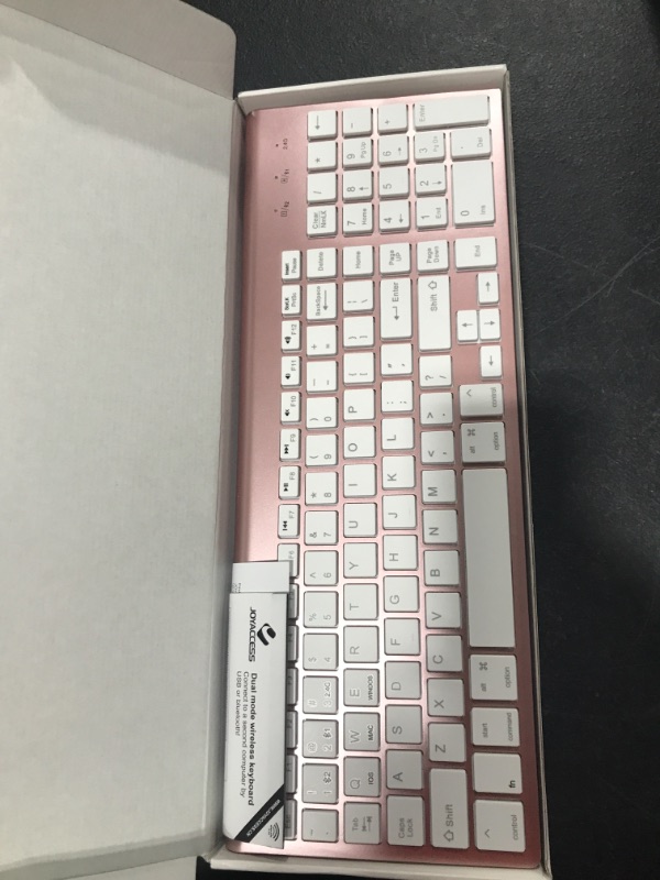 Photo 2 of Bluetooth Keyboard, Pink Wireless Keyboard with Number Pad, J JOYACCESS Dual Mode Slim Keyboard Connects Up to 3 Devices for iMac/Mac,MacBook, iPad,Laptop,Android,Windows
