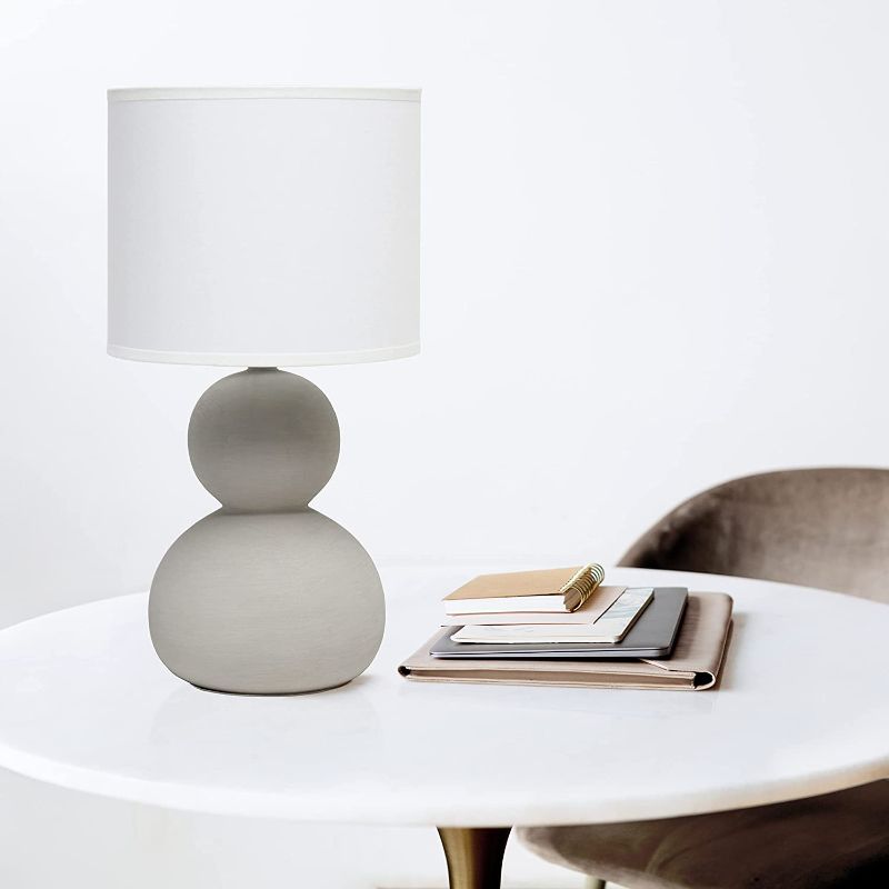 Photo 1 of Simple Designs LT1116-TAU Stacked Stone Age Table Lamp, Taupe Gray
