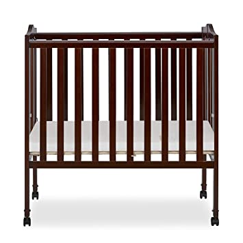 Photo 1 of Dream On Me 2-in-1 Folding Portable Mini Crib, Cherry Wood