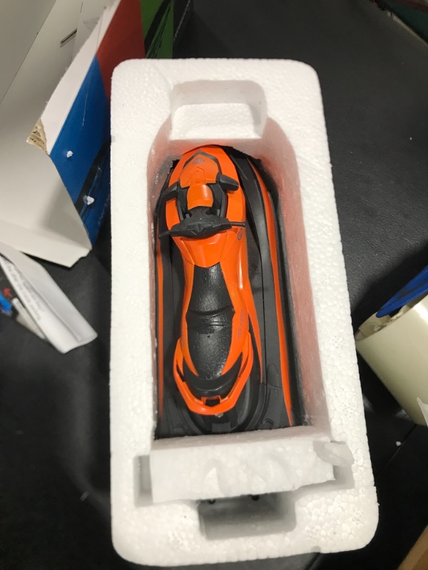 Photo 2 of IOKUKI 2.4G RC Boats for Kids - Remote Control Boat for Kids and Adults for Lakes and Pools with 2 Batteries / Dual Motors/2 Charger Cables and Low Battery Prompt Motor Boat (Orange)