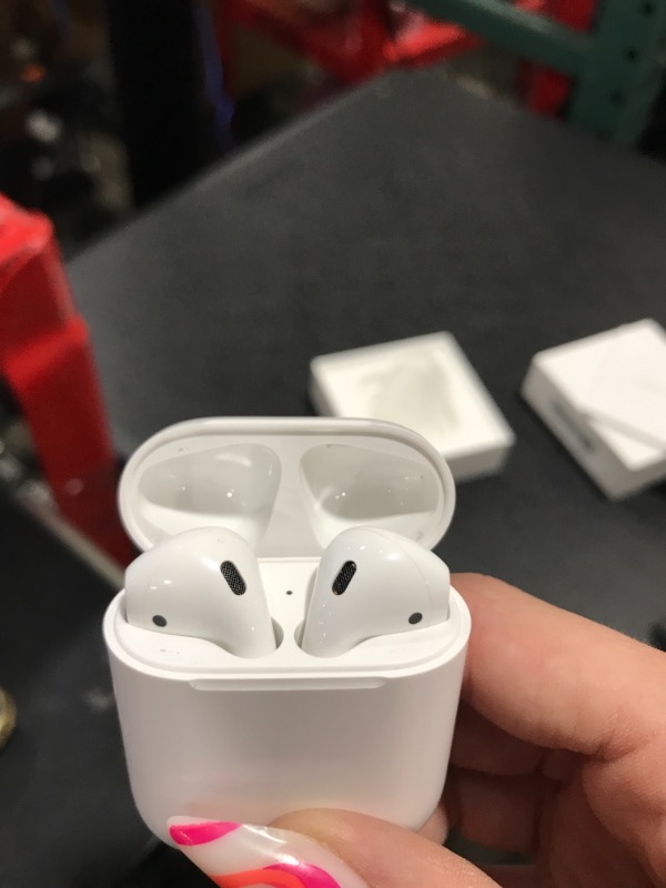 Photo 2 of Apple AirPods True Wireless Bluetooth Headphones (2nd Generation) with Charging Case
