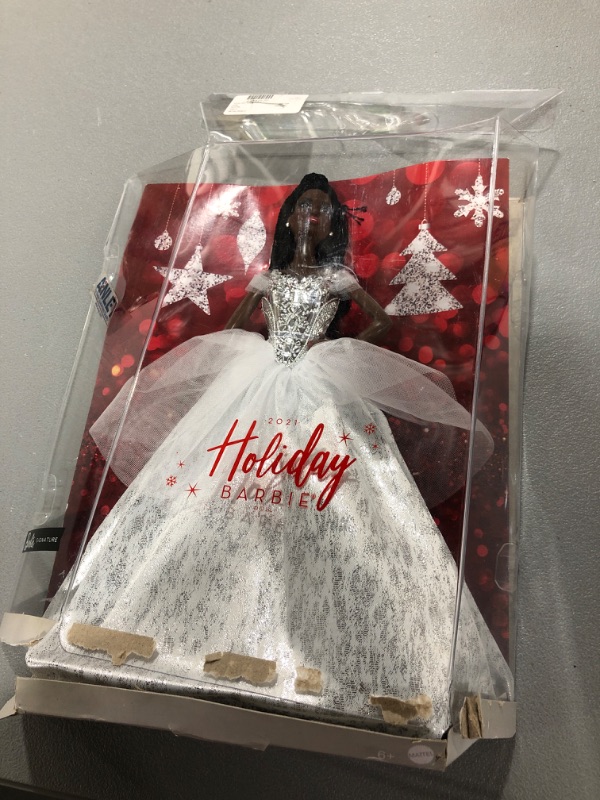 Photo 2 of Barbie Signature 2021 Holiday Barbie Doll (12-inch, Brunette Braided Hair) in Silver Gown, with Doll Stand and Certificate of Authenticity, Gift for 6 Year Olds and Up
