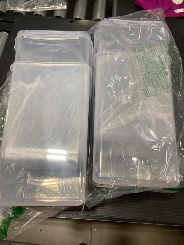 Photo 1 of 4 PACK OF PLASTIC BINS WITH BLUE LIDS 