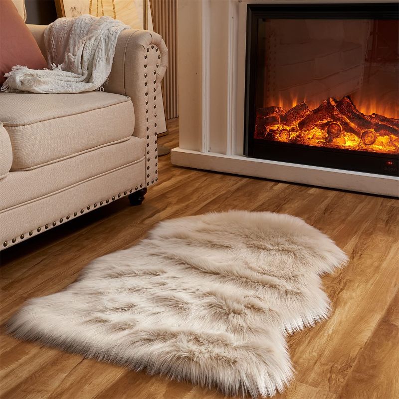 Photo 1 of Arbosofe Faux Fur Sheepskin Rug Beige Home Area Rug for Bedroom, Fluffy Small Fur Rug, Fuzzy Furry Shaggy Rug for Living Room 2 x 3 Feet
