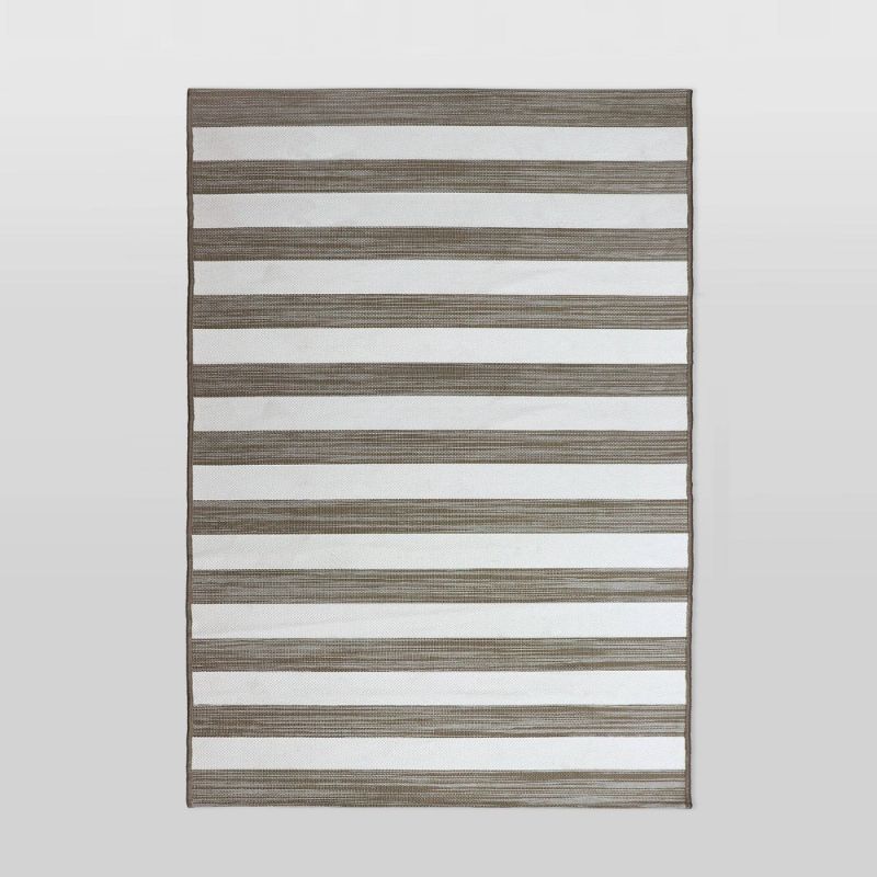 Photo 1 of 6'x9' Outdoor Rug Worn Stripe Tan - Threshold
