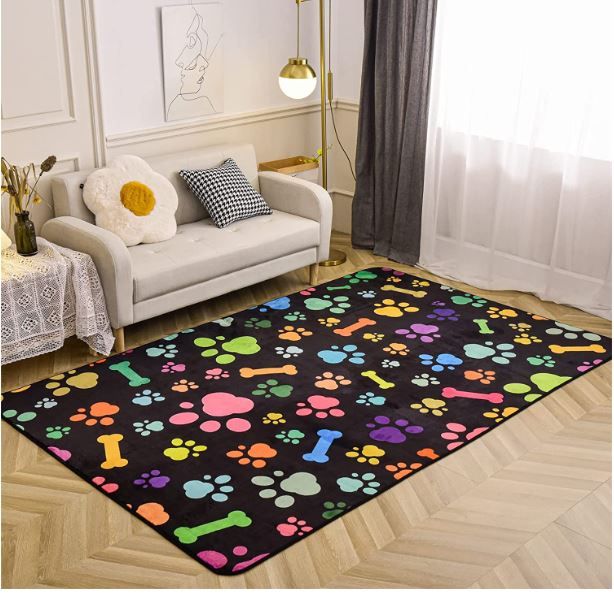 Photo 1 of Aimuan Colorful Dog Paw Print Area Rug Nursery Soft Fun Puppy Dog Decor Bones Rugs Cute Flannel Floor for Living Bedroom (5x8 feet, Black)