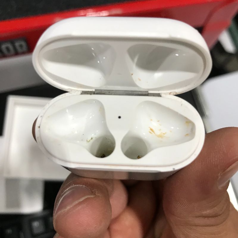 Photo 4 of Apple AirPods with Charging Case (Latest Model)