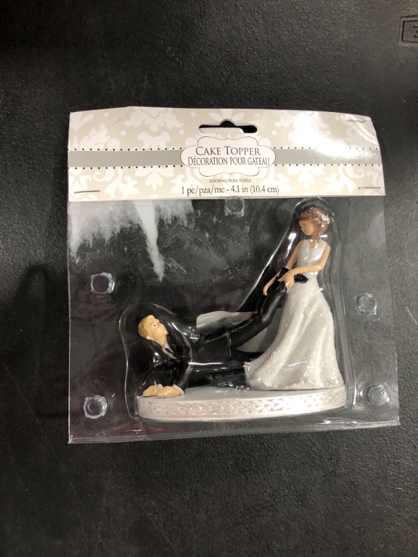 Photo 2 of Amscan Comical Leg-Puller Wedding Cake Topper Party Supply, Black and White, Plastic , 4"