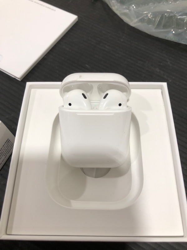 Photo 2 of Apple AirPods (1ST Generation) MV7N2AM/a with Charging Case - Stereo - Wireless - Bluetooth - Earbud - Binaural - in-ear
