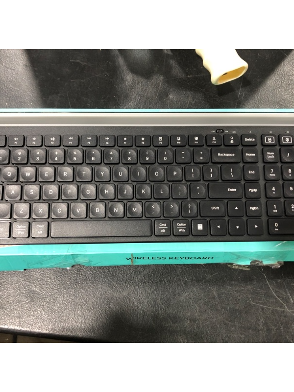 Photo 1 of bluetooth wireless keyboard with multi device holder
