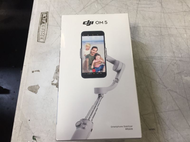 Photo 2 of DJI OM 5 Smartphone Gimbal Stabilizer, 3-Axis Phone Gimbal, Built-In Extension Rod, Portable and Foldable, Android and iPhone Gimbal with ShotGuides, Vlogging Stabilizer, YouTube TikTok Video, Gray FACTORY SEALED 

