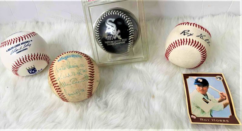 Photo 1 of BASEBALL COLLECTIBLES, 4 BASEBALLS AND ROY HOBBS CARD