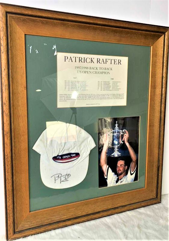 Photo 1 of WOOD FRAMED SHADOW BOX, PATRICK RAFTER US OPEN CHAMPION, AUTOGRAPHED HAT, PHOTO AND STATS