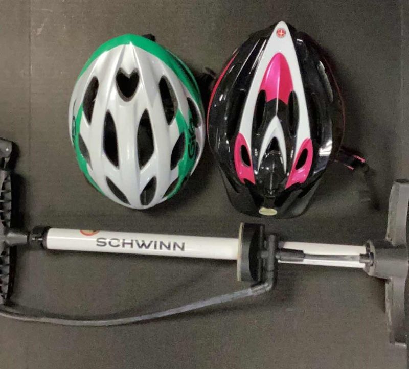 Photo 1 of 2 LADIES BICYCLE HELMETS AND A SCHWINN PUMP