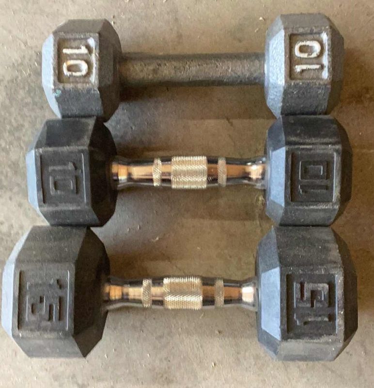 Photo 1 of 3 DUMB BELLS 10, 10, AND A 15 POUND